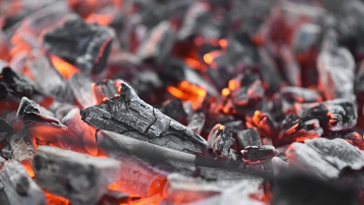 Charcoal burn in the barbecue grill. Close up