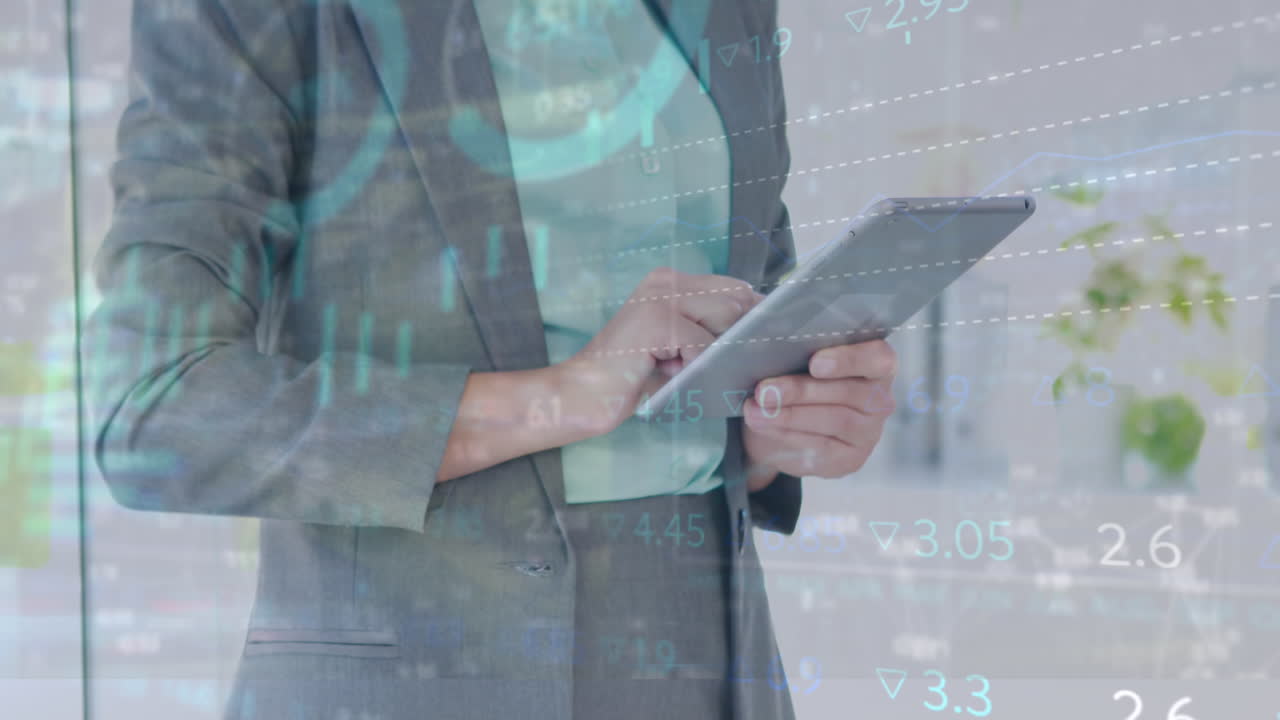 Animation of stock market data processing over mid section of businesswoman using tablet at office