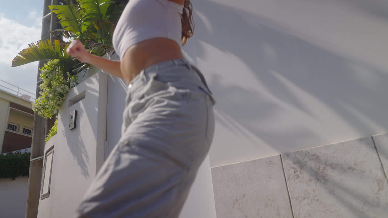 Woman Dancing and Walking Outdoors