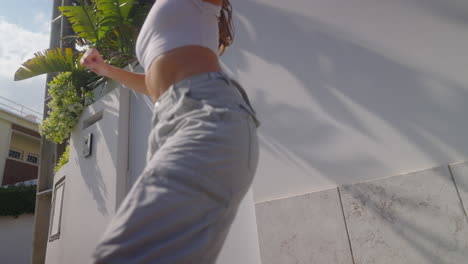 woman dancing and walking outdoors