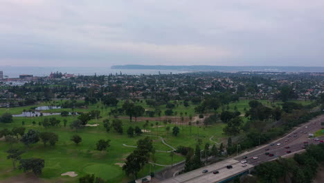 San-Diego-Coronado-Bridge-With-Golf-Course-And-Coronado-Island-In-Background-In-California,-USA