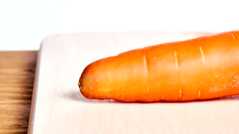 sliced carrot on a kitchen board- stop motion animation and timelapse