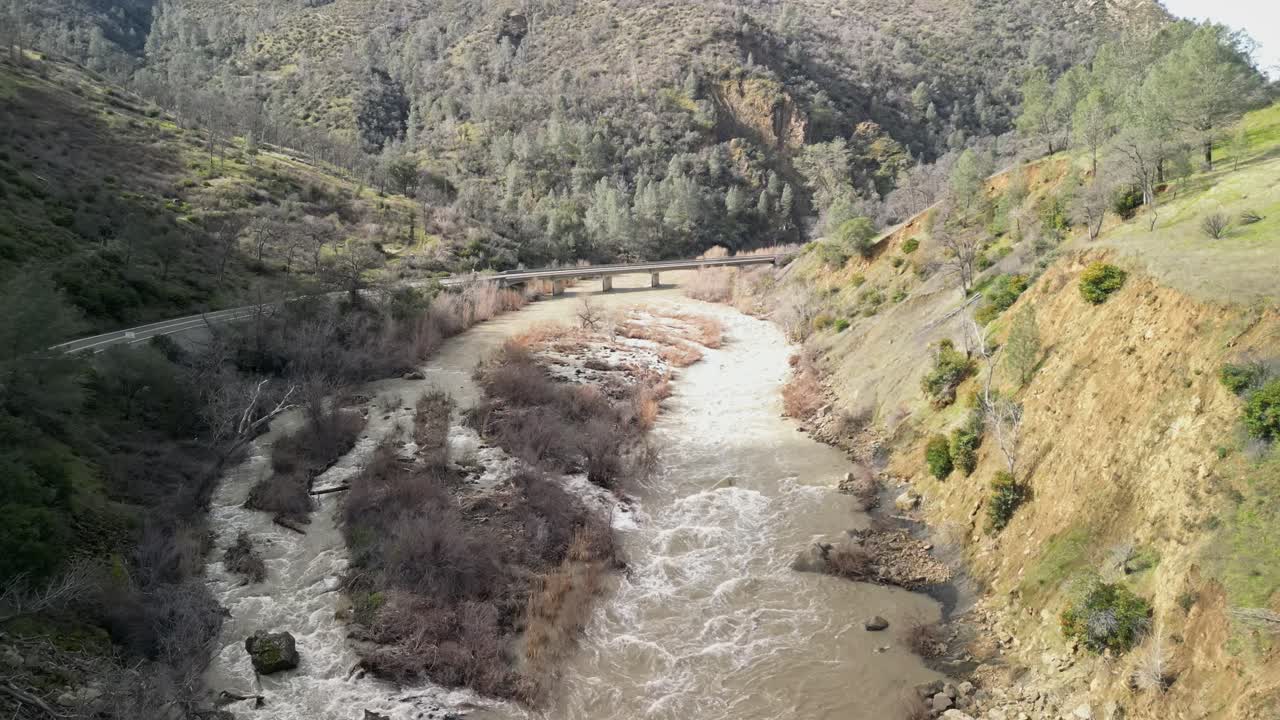 Looking down from the sky, Cache Creek’s twisting flow and rocky banks create a striking natural pattern.