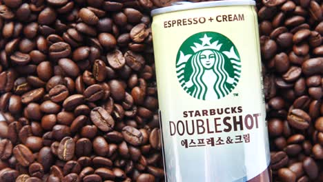 starbucks doubleshot espresso + cream can on coffee beans