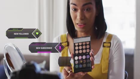animación de datos de redes sociales e íconos sobre mujer biracial en vlog de maquillaje.