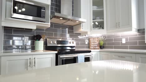 real estate slide past lemons on marble counter to show off high end stove smooth gimbal view