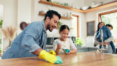 Father,-daughter-and-spray-table-for-cleaning