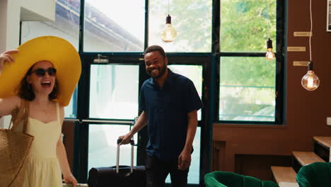 Hotel-guests-arriving-with-luggage