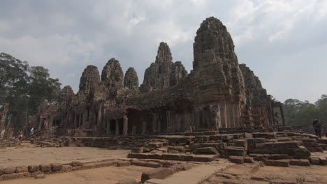 temple compound emerging from the jungle in angkor wat, cambodia