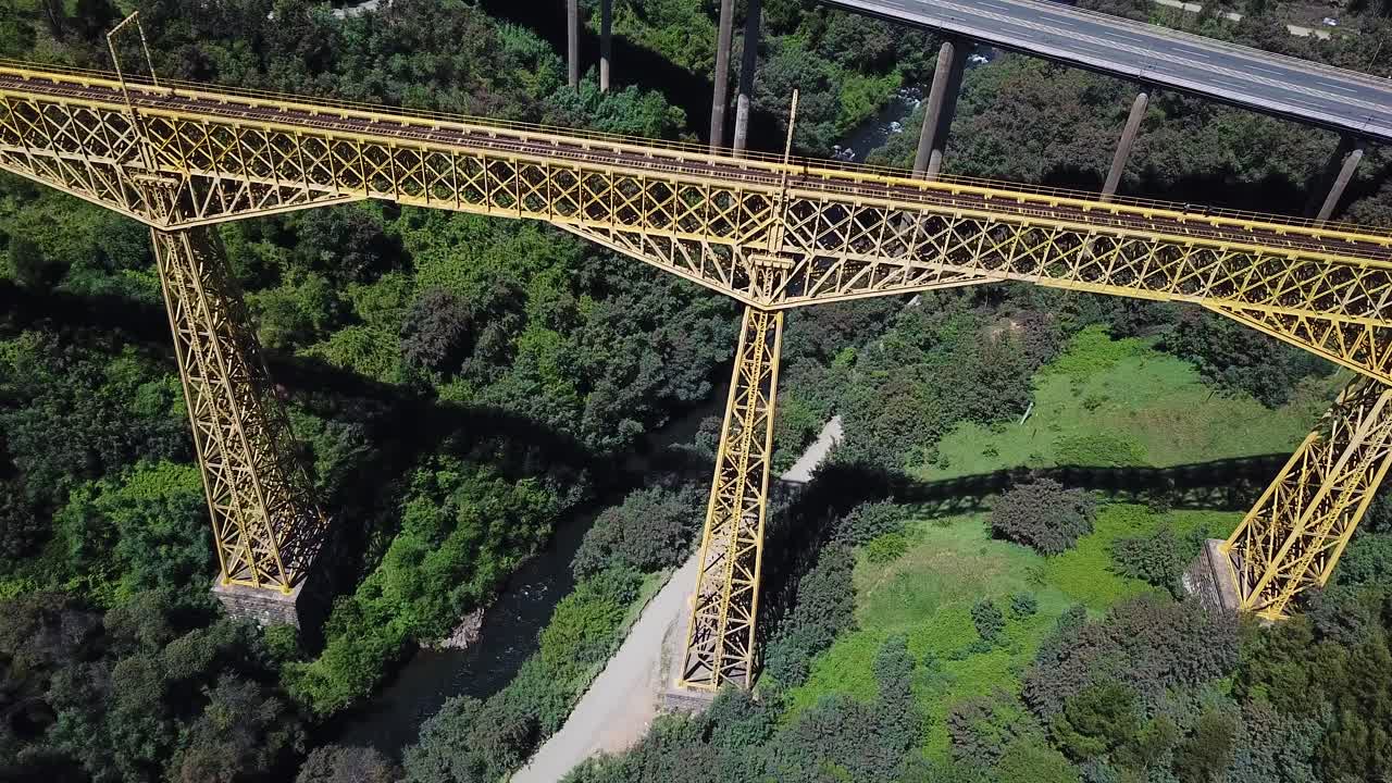 Callipulli, Chile. Old Malleco Railway Viaduct, Birds Eye Drone Aerial View of Monument and Green Canyon