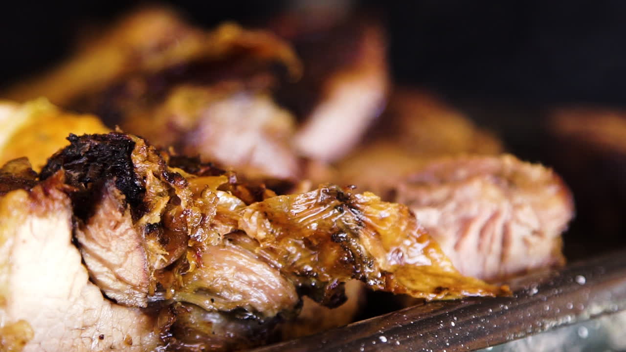Typical parrillada, barbecue, with meat and potatoes in Argentina, close up