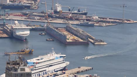 ferries and boats maneuvering in naples harbor