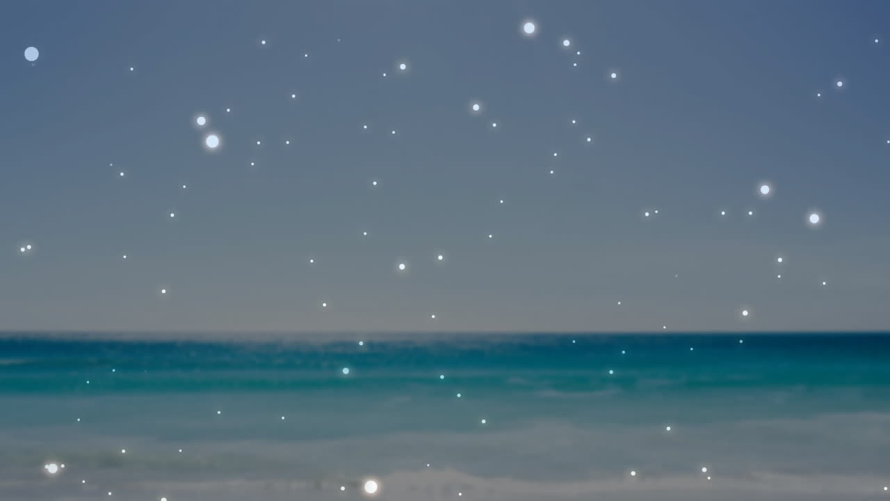Sparkling lights animation over serene ocean waves and clear sky