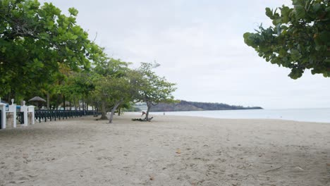 caribbean beach establishing shot, grand anse beach in grenada