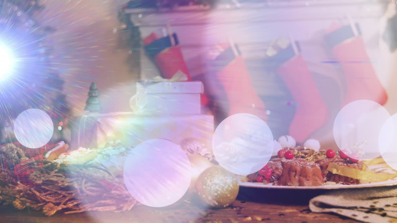 Lens flare bursting on left edge starting bokeh orbs drifting across festive table, revealing gifts