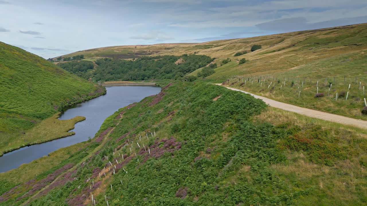 Aerial footage of Yorkshire countryside valleys moorland and