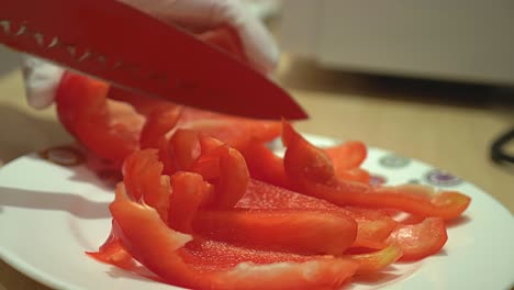 a red paprika is cut into strips