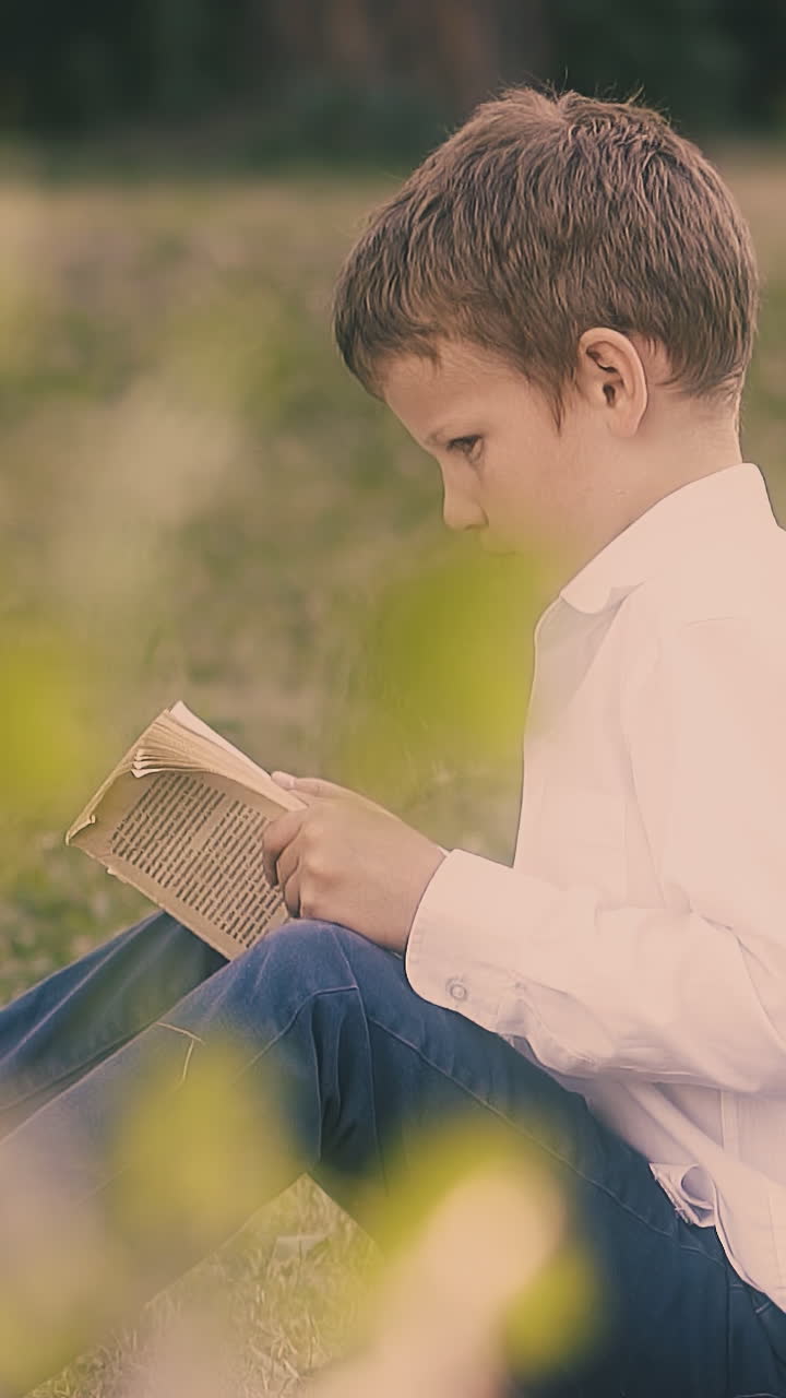 exhausted pupils sit on green school garden lawn try to study reading books to prepare for difficult exams slow motion
