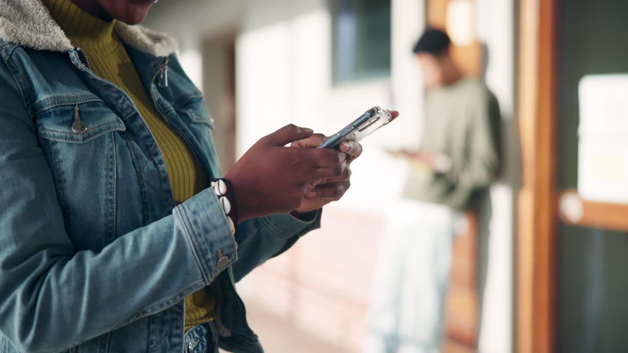 Students using phones indoors
