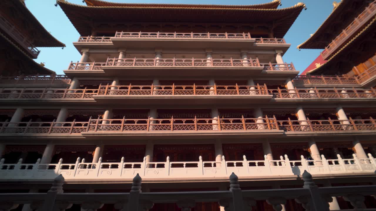 Historic chinese building in Jing'an temple complex in Shanghai, Tilt up.