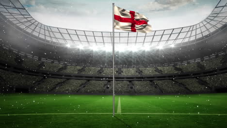 animation of golden confetti falling over waving england flag against sport stadium