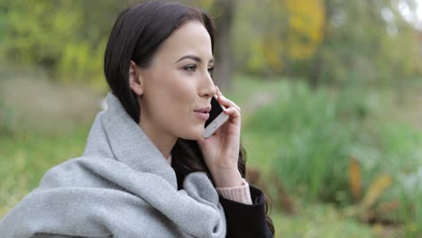 attractive woman speaking on phone