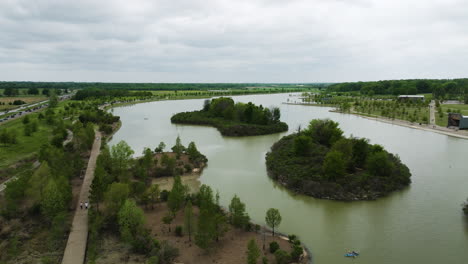 Shelby-farms-park-in-memphis-with-lakes-and-greenery-on-cloudy-day,-scenic-outdoor-landscape,-aerial-view