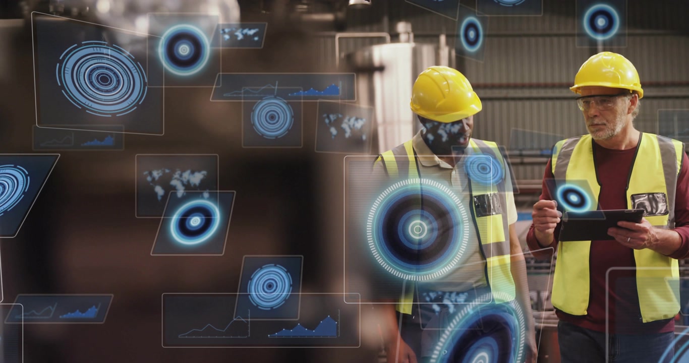 Senior worker using tablet and peer walking plant, tablet activating AR overlay, inspecting tanks