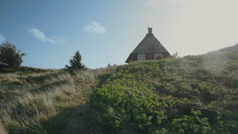 POV-Walking-to-Magical-Red-Building-in-Middle-of-Nature-Reserve-Jutland