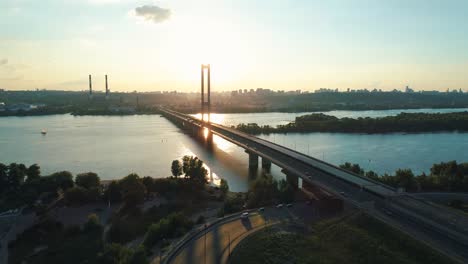 aerial drone footage. fly to south bridge in kyiv at sunset