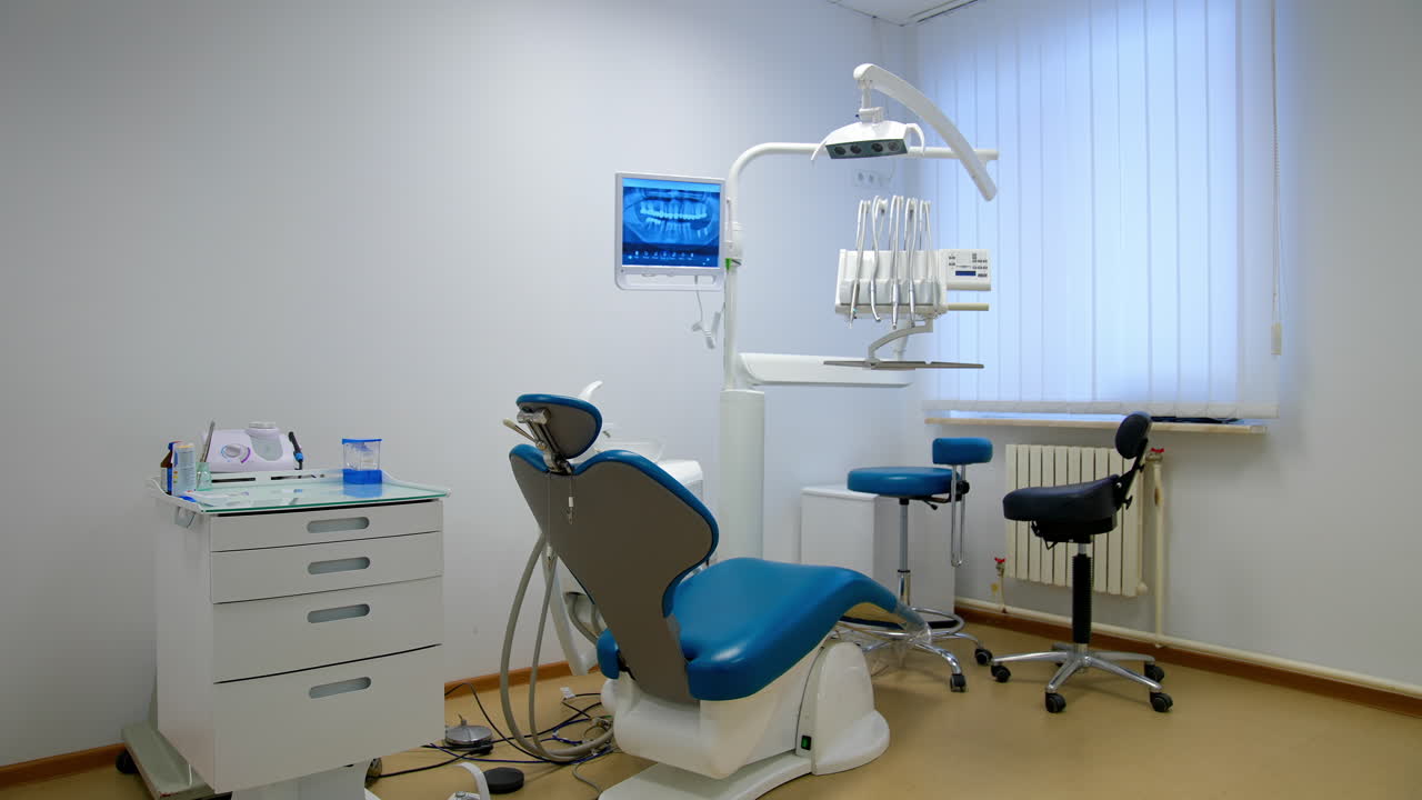 Interior of modern dental clinic. Interior of new modern dental clinic office with chair