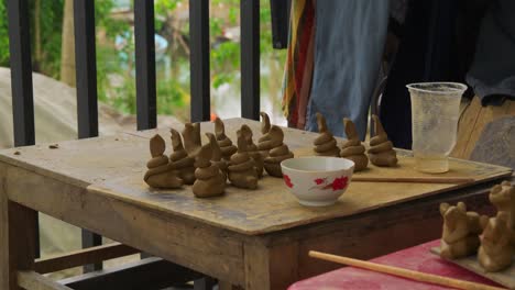 experience the artistry and heritage of thanh ha village with a close-up of the creation of animal clay flutes, perfect for traditional pottery and souvenir-making for tourism