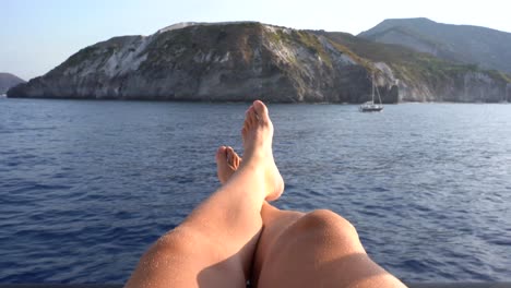 sitting on the yacht while sailing to san vito lo capo in sicily