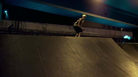 active hipster skateboarding ramp skatepark. young skater riding on skate board.