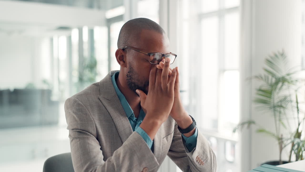Stressed businessman in office