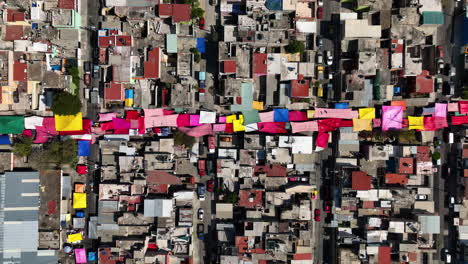 aerial view above a tianguis open air market and bazaar in mexico city - top down, drone shot