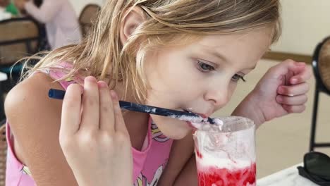 young girl enjoying ice cream