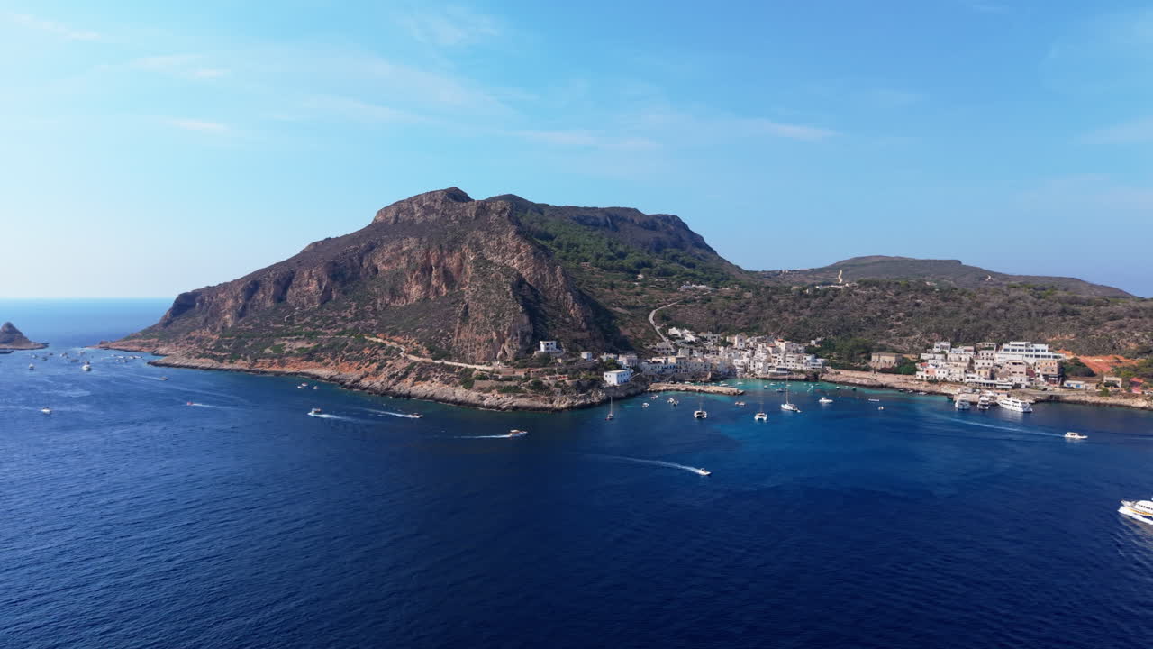 Aerial Sicily view, calm blue sea and rocky coast, summer tranquility