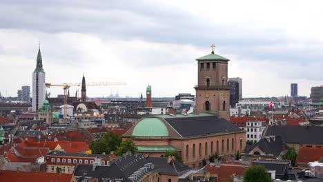 establishing cityscape of copenhagen with view of cathedral and maintenance works, 4k