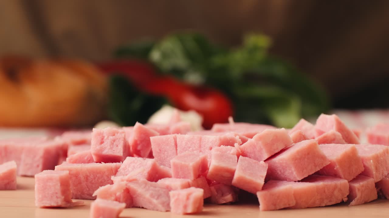 Ham italian mordatella, man Slices Of Traditional Italian antipasti mortadella sausage on a wooden cutting board, close up macro of chicken or turkey jamon, fat breakfast dish.