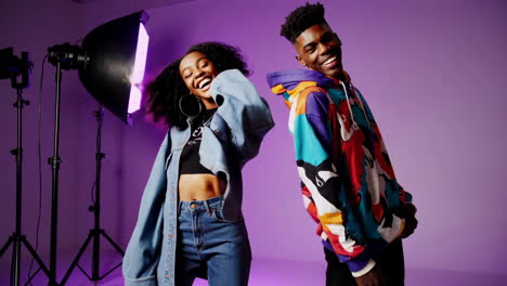 joyful studio photoshoot of trendy young adults
