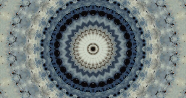 Blue ink creating kaleidoscope