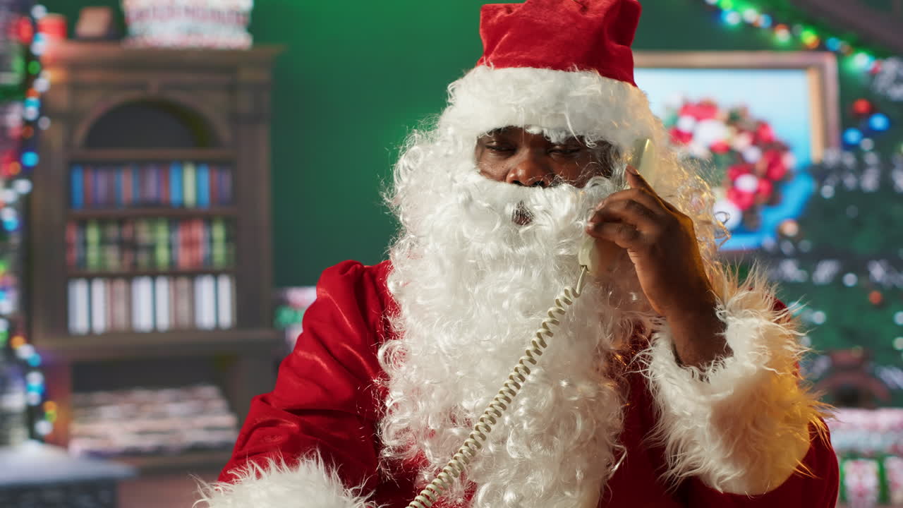 Santa Claus Taking Calls and Reading Letters