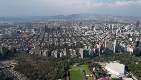 Drone-Shot-Of-Bosque-De-Chapultepec,-Campo-Marte,-Auditorio-Nacional-And-Neighborhood-Of-Polanco-In-Mexico