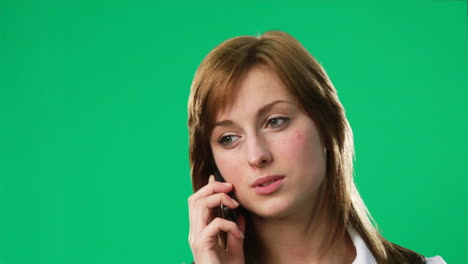 Green-Screen-Footage-of-a-woman-on-the-phone