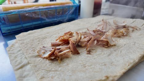 preparing a chicken shawarma