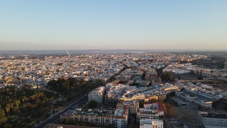 aerial drone shot of seville, the capital city of spain's andalusia region. seville is known for its culture, heritage, and being the birthplace of flamenco.