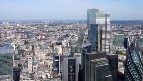 close up aerial view of the city of london towers including the walkie talkie building, gherkin, leadenhall and views of the river thames and the shard, london, uk