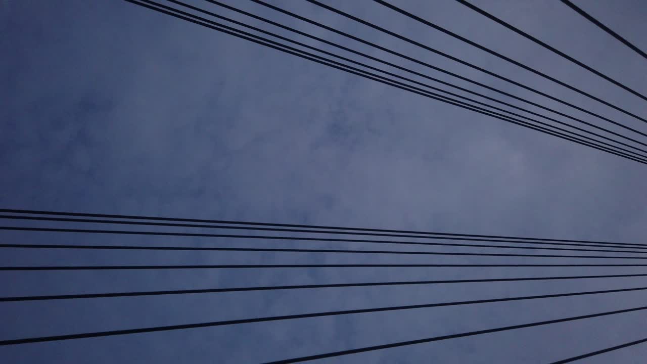 Looking up at cables and towers of My Thuan Bridge a large suspension bridge or cable stayed bridge in the Mekong Delta in Vietnam