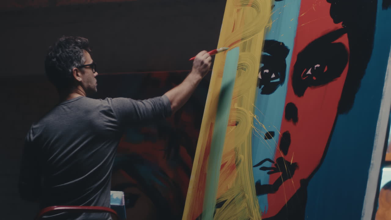 Artist Painting a Pop Art Portrait in Studio